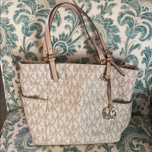Michael Kors purse. Cream and gold